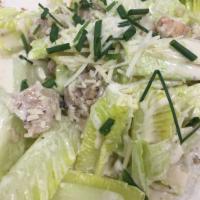 Chicken Caesar Salad · Chopped romaine lettuce, croutons, shredded Parmesan cheese, chicken breast
