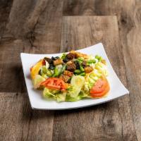 Garden Salad · Lettuce, Tomato, Onions, Cucumbers, Black Olives, Green Peppers, Cheese, and Croutons