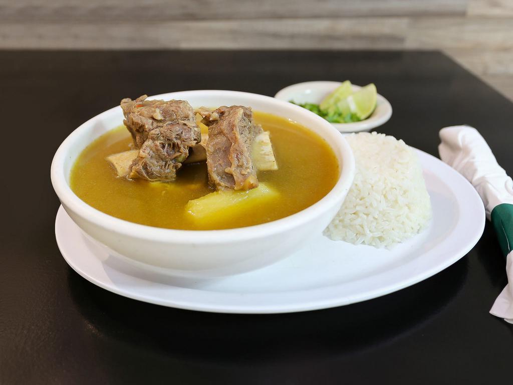 Sancocho Soup · Colombian short rib soup served with rice.