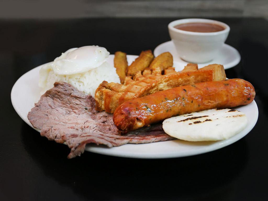 Bandeja Paisa · Choice of protein, sweet plantains, beans, pork belly, arepa, and rice topped with a fried egg.