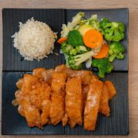 Chicken Katsu Curry · Tender crispy breaded chicken breast fillets served with our Thai curry  sauce