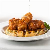 2 Piece Fried Chicken and Waffle · Served with cheddar, bacon, green onions and maple syrup.