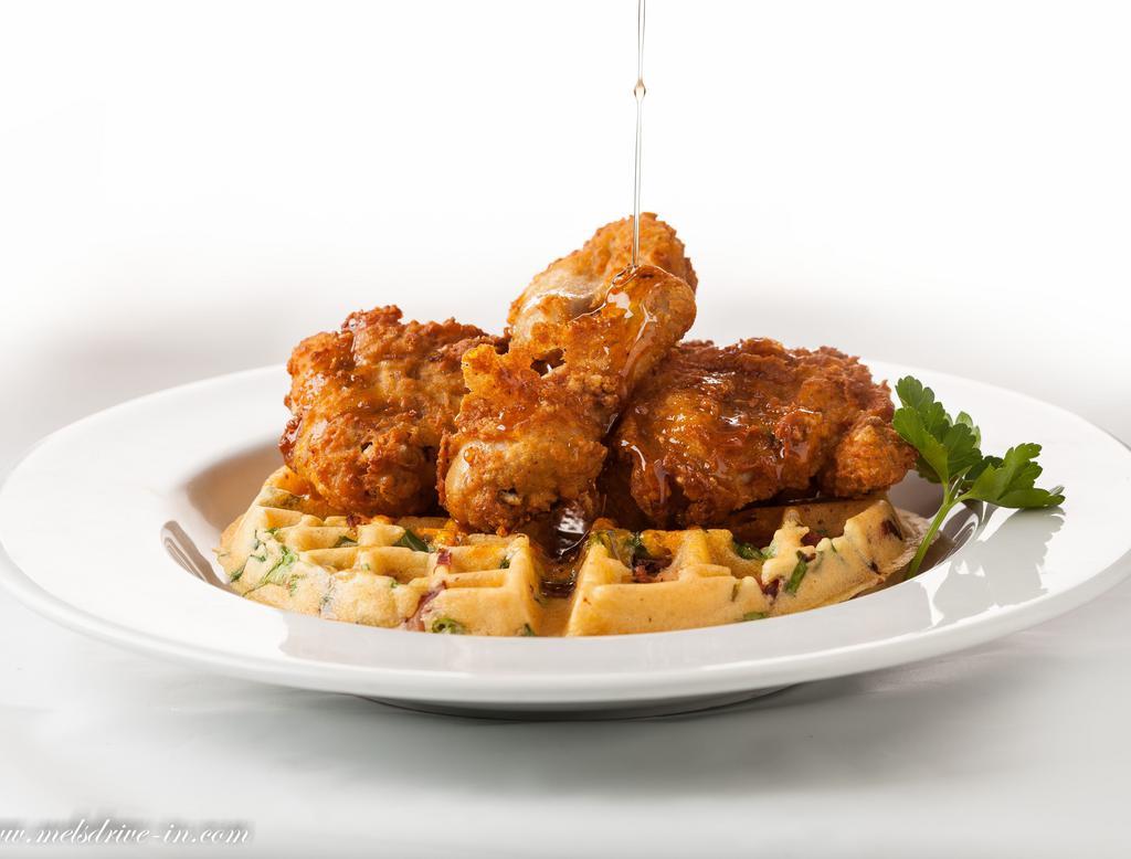 2 Piece Fried Chicken and Waffle · Served with cheddar, bacon, green onions and maple syrup.