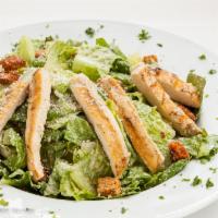 Caesar Salad with Charbroiled Chicken Breast · Fresh, crisp romaine lettuce tossed with Caesar dressing. Topped with grated Parmesan cheese...