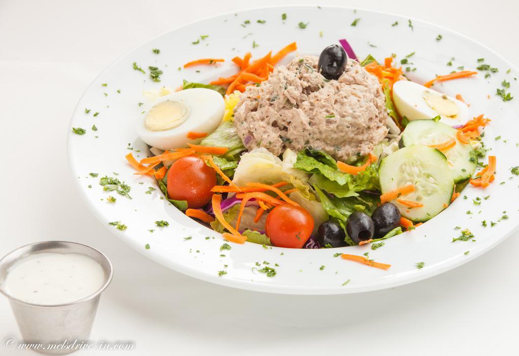 Albacore Tuna Salad · Comes on lettuce with tomato, cucumber and sliced egg. Gluten-free.
