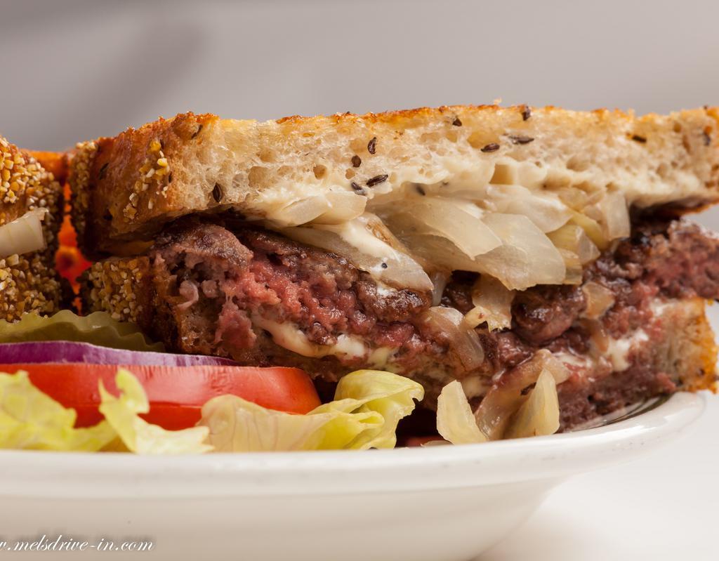 Patty Melt Burger · A juicy 1/3 lb. grass-fed hamburger patty with melted Swiss, grilled onions on grilled Jewish rye with 1000 Island. Winner L.A. Times 