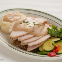 Homemade Turkey Dinner · Served the old-fashioned way with stuffing, homemade gravy, fries , fresh vegetables, roll a...
