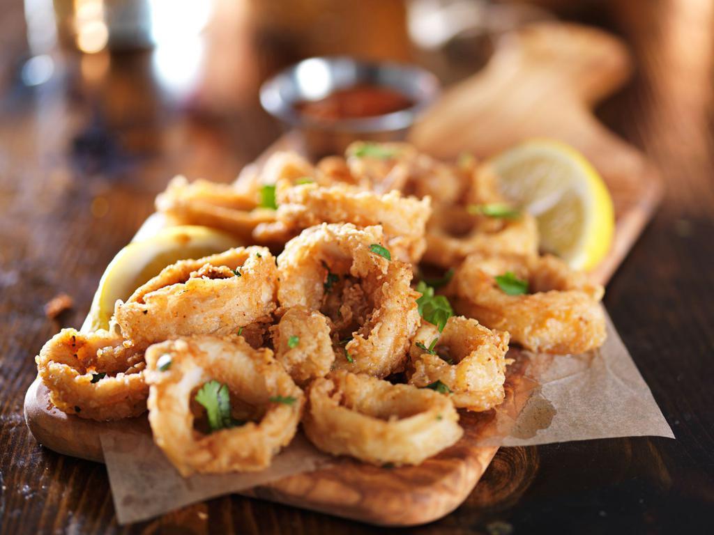 Fried Calamari · 1/2 Ib. calamari lightly battered and fried to a golden crisp. Served with marinara sauce.