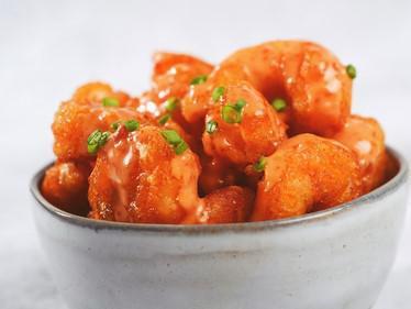 Dynamite Shrimp · Crispy fried shrimp tossed in Cameron's hot and sweet chili sauce
