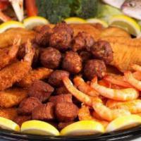 Fried Ultimate Seafood Party Platter · 1 lb. spiced shrimp, 1 lb. fried shrimp, fried scallops, 20 pieces of fish, 20 crab balls. S...