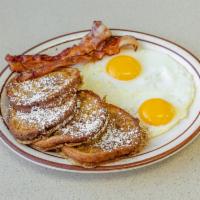 Joe's Cinnamon French Toast · 4 slices of our home style cinnamon bread with 2 eggs, choice of side.