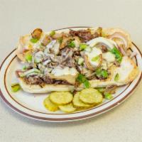 Philly Steak Sandwich · Grilled onions, mushrooms, peppers and Swiss cheese.