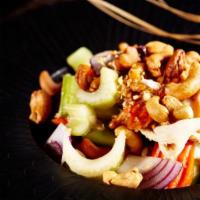 Cashew Nut Chicken · Sliced chicken breast stir-fried in our famous cashew nut sauce with red and green bell pepp...