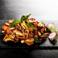 Drunken Noodles (Khi Mao Noodles) · Inspired by Thailand countryside tastes, these stir-fried wide rice noodles are mixed with e...