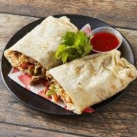 Super King Burrito · A near footlong flour tortilla filled with extra fillings of beans, lettuce, tomato, sour cr...