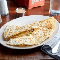 Smoked Cheese Quesadilla · Smoked Gouda and creamy havarti cheese with grilled chicken and caramelized onions. Served w...