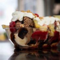 Banana Split · Sure to satisfy any sweet tooth!  Your choice of our super premium ice cream nestled on a sp...