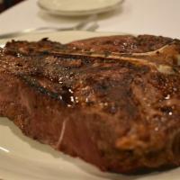 16 oz. New York Strip · Hand selected steak topped with a red wine reduction, mushrooms, and a hint of rosemary. Ser...