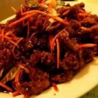 S15. Hot Crispy Beef · Deep fried beef to crispy with home style hot and sweet spicy sauce. Served with white rice....