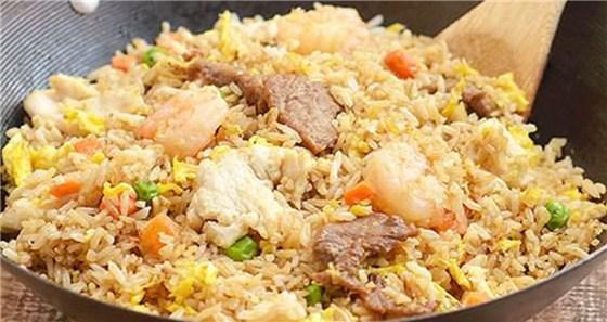 31. Large Yang Chow Fried Rice · Comes with shrimp,chicken, bbq pork, vegetables and egg