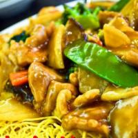 40. Pan Fried Noodle with Chicken · Served with white rice.