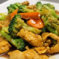 59. Chicken with Broccoli · Served with white rice and white meat.