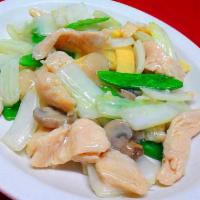 65. Large Moo Go Gai Pan · Served with white rice and white meat.