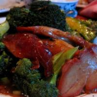 70. Roast Pork with Broccoli · Served with white rice.
