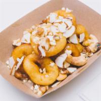 Just Nuts · Donut covered in white chocolate and 4 kinds of nuts. Cashews, peanuts, walnuts and almonds