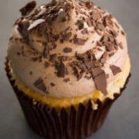 Vanilla-n-Chocolate Cupcake · Vanilla bean cake with chocolate buttercream topped with chocolate curls.