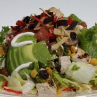 Southwest Chicken Salad · Baby greens and chopped romaine, grilled chicken, sliced avocado, black bean corn salsa, sou...