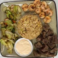 Filet Mignon and Shrimp Combination · Boneless sliced meat and shell fish.
