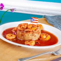 Mofongo de Camarones · Fried plantains, seasoned and mashed together to form a mountain of deliciousness! Topped wi...