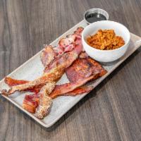 When Pigs Fly · A flight sampling each of our bacons braised pork belly, candied bacon, corn cob smoked, pec...