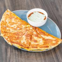 Brunch Quesadilla · Sausage, black beans, cheddar and jack cheeses. Comes with avocado crema and house salsa.