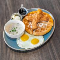 Chicken and Waffle · Belgian waffle, crispy chicken strips, 2 eggs cooked to order and pork sausage gravy. limite...