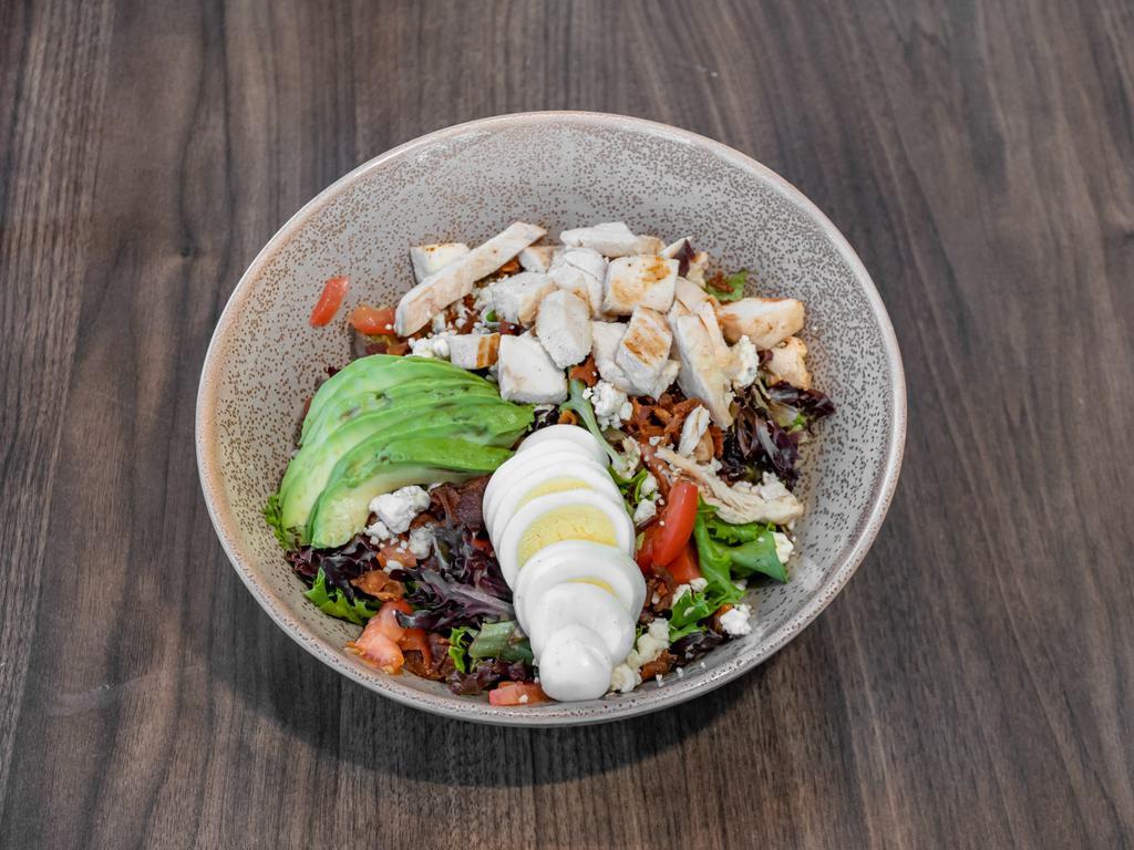 Cobb Salad · Mixed greens, chicken, bacon, tomatoes, boiled egg, avocado and blue cheese. Gluten Free.