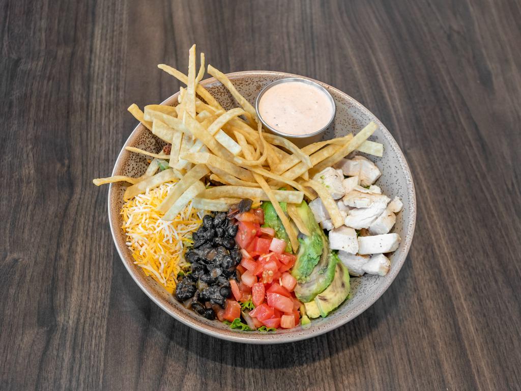 Southwest Salad · Mixed greens with house black beans, sliced avocado, cheddar cheese blend, diced tomatoes, crispy white corn tortilla strips with southwest ranch and salsa on the side.