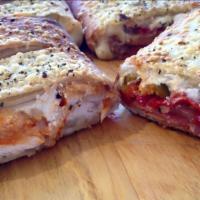 The Peel Calzone · Rolled fresh and stuffed with mozzarella, ricotta and your choice of toppings. Served with a...