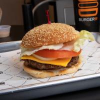 1/3 lb. Angus Beef Big Burgerim · House sauce, leaf lettuce, Roma tomato, pickles, shaved onions, and American cheese.