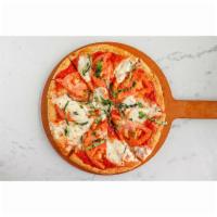 Margherita Pizza · Vine-ripe tomato, fresh Mozzarella and basil