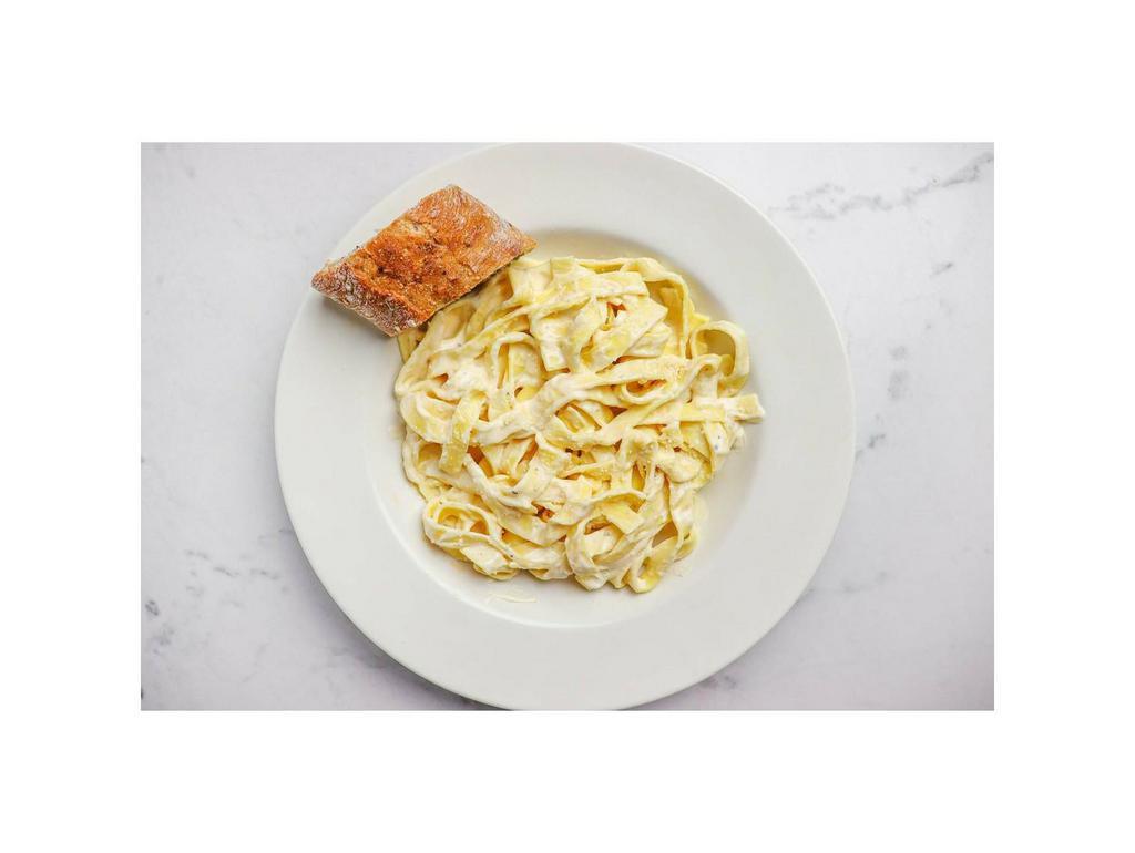 Fettuccine Alfredo Pasta · Fettucine noodles, rich cream sauce,
with imported Parmesan cheese, butter and cream.
Topped with cracked black pepper.