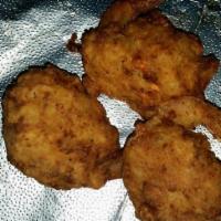 Shrimp Conch Tail · 3 pieces. Shrimp and conch fritters.