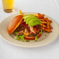 The Dillinger Burger · Bacon, grilled onions, sauteed mushrooms, avocado, lettuce and cheddar. Served with hand-cut...