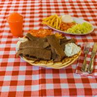 Gyro Plate · A health portion of gyro meat, lettuce, tomatoes, onions, gyro sauce, and 2 pita served with...