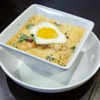 Creamy Lobster Soup · Comes with shrimp, veggies and topped with a fried egg.