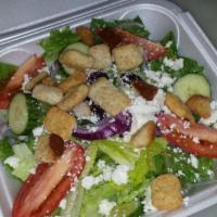 Greek Salad · Lettuce, tomatoes, onions, feta, cucumbers, pepperoncini and Kalamata olives.