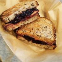  PB & J · Peanut butter and jelly served on toasted whole-wheat bread.