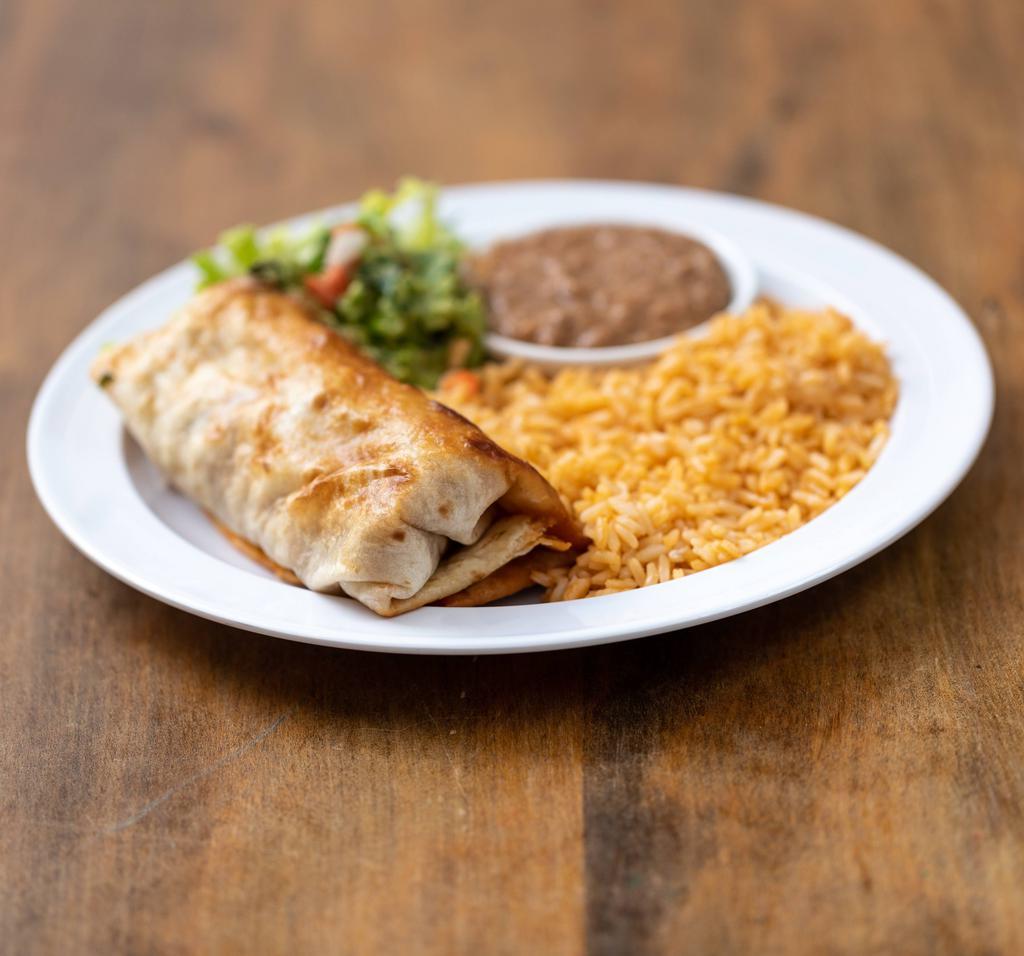 Chicken Chimichanga · Flour tortilla filled with shredded chicken. Served with rice, refried beans, lettuce, pico de gallo, guacamole and sour cream.