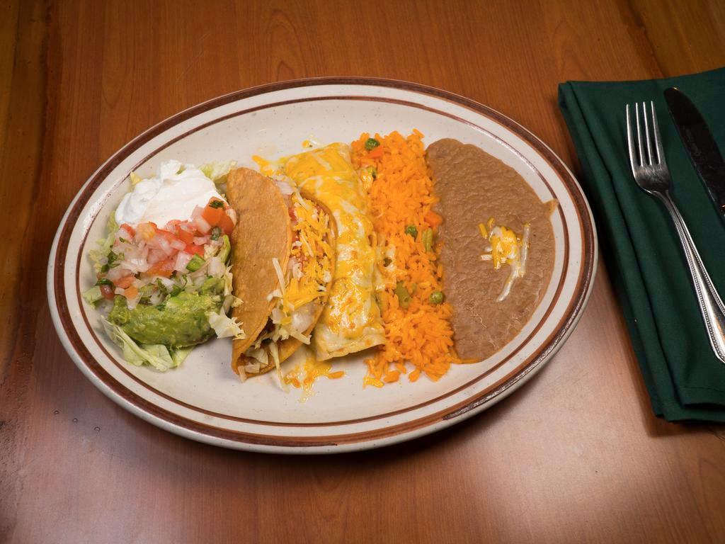 6. Chicken Enchilada and Chicken Taco Combination · Served with beans, Mexican rice, lettuce, pico de gallo, guacamole and sour cream, shredded beef and chicken.
